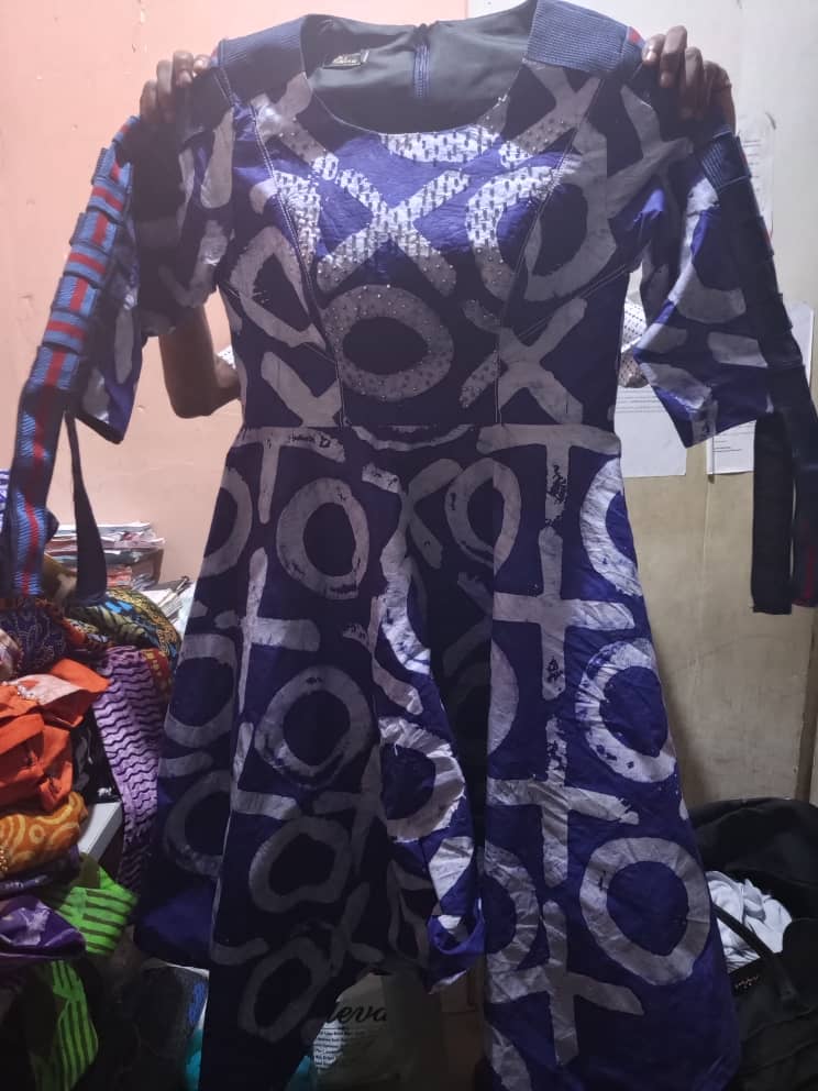 Adire zig zag gown with basket aso-oke sleeve